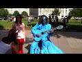 Blue guitar man + spot the transvestite policeman Blue guitar man + spot the transvestite policeman