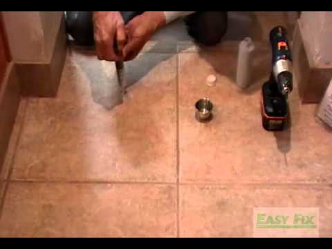how to repair loose floor tiles