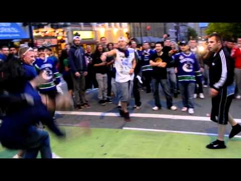 Vancouver Riots 2011 - Live Raw Footage - Guy Knocked Out With One Punch