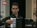 a song composed by apostolos hatzihristos and performed on the greek 902 channel tv show 