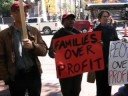 Group protests at Harvard Square banks