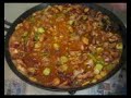 Paella de conejo y pollo
