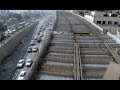 Recorrido aereo por el segundo piso del periferico de la ciudad de Mexico durante la ultima parte de su construccion, imagenes provenientes del documental 
