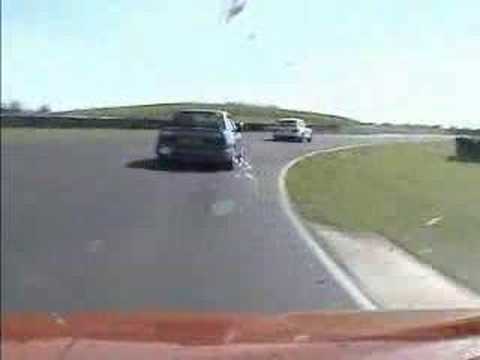 croft - 205 Mi16 chasing modified Sierra Cosworth at Croft. Ford RSOC show, July 2005.