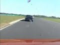 205 Mi16 chasing Sierra Cosworth at Croft