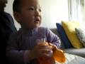 Baby Natalie watching football with daddy