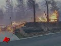 Raw Video: Fires Rip Through Mobile Home Park