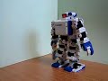 i-SOBOT hits a ball. i-SOBOT hits a ball.