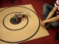 Stamp Bug Robot automatically adjusting itself on the dart board. Stamp Bug Robot automatically adjusting itself on the dart board.