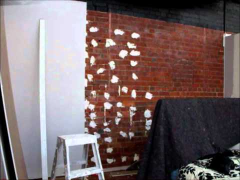 how to fasten plasterboard to brick