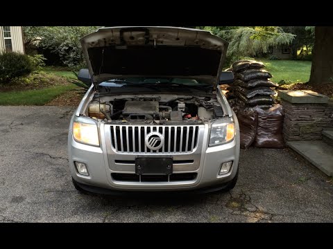 HOW TO: Ford Escape / Mercury Mariner / Mazda Tribute Headlight Bulb Replacement (2008-12)