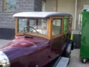 Bullnose Morris with canine enthusiast.