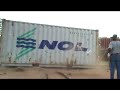 The container drops to the ground.