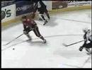 Pekka Rinne makes a sliding save on Quad City's Kris Kolanos