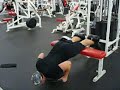 Glut Ham Raises with 45 lb plate