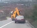The Audi is trying to overtake the backhoe, but in Montenegro that's not an easy thing to do.. I was on my way to the seaside when this happened. Many thanks to my Nokia 6300.