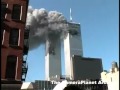 Shot of two towers burning from street level. Shot of...