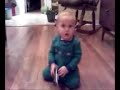 Alon crawling and playing with box Alon crawling and playing with box