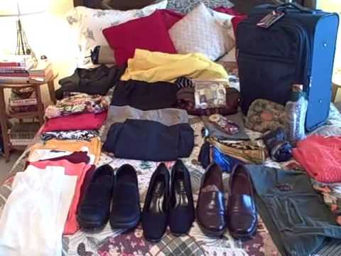 how to fit clothes in a suitcase