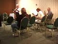 jim robinson (88), tenor banjo and ruth ellen robinson (85), keyboard, lead a reader's jam in robert e. lee, at figa st. louis, 2001