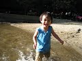 Triston playing in water Ceder Ridge