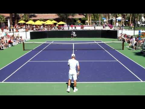 practice - Here is Nole getting in a light workout with hitting partner Dusan Vemic at La Quinta Resort and Spa in Indian Wells California.