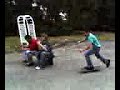 T.J. ollies over 3 skateboards T.J. ollies over 3 skateboards