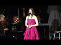 Idina Menzel, with Marvin Hamlisch conducting the Pasadena Pops, sang circles around standards, classic pop and her Broadway best at the Greek Theater in hills of Griffith Park in Los Angeles.