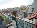 Enrique on balcony for TV show in UK