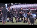 the university of hawaii doing the haka during a pre-game warmup.
