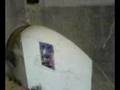 Sellotape cast of face with bingo ink.