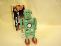 http://www.opamerica.com   Presenting a brand new reproduction of the Lilliput Robot from Schylling Toys.   This is a great tin toy reproduction! It looks good, its plays good and it even feels good! The detailed graphics invite you to take a closer look.  Measures 6 1/2