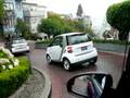 smart cars go down Lombard St., SF