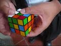 Dominic solves the Cube