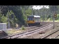 150141 and 142065 pause at Mossley Hill 150141 and 142065 pause at Mossley Hill