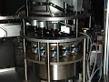 Aerosol Can Actuator Orienting Machine
