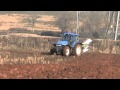 New Holland TM120 Ploughing.