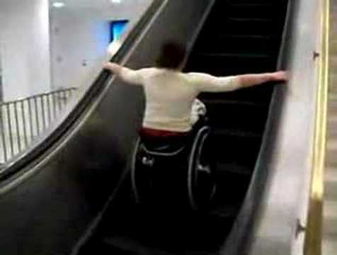 Wheelchair vs Escalator.