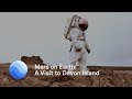 A person in a spacesuit standing on a rocky terrain overlayed with the text; "Mars on Earth: A Visit to Devon Island"