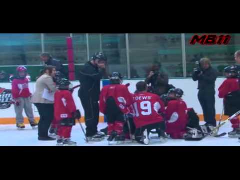 mokyboy11 - Jonathan Toews accidentally runs into a kid and sends him to the ice during a hockey camp.