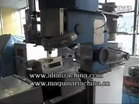 insertadora - Maquina automatica para fabricar cepillo.