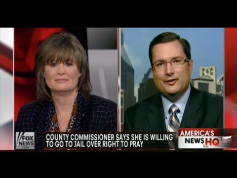 Commissioner defies judges order, opens meeting with prayer Commissioner defies judges order, opens meeting with prayer