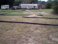 Kyosho ST-RR in backyard track with new dirt jumps