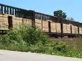 CN5254 and an ex WC SD45 descend Byron Hill with 143 cars