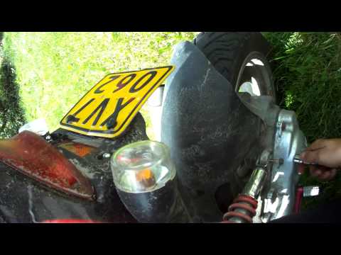 how to adjust ncy rear shock