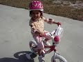Dee Xarlize rides her bike