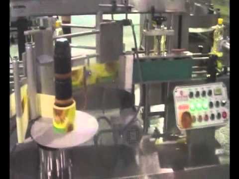 Aвтоматическая волюметрическая машина для розлива масла . 10 выпускных отверстий