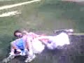 2 kids try to jump a fence with a twist