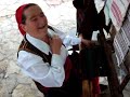 Macedonian Folk-2009-Old women is doing sth traditional...