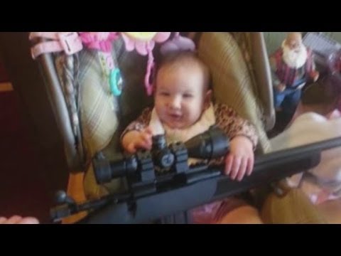 The Internet Blew Up After This Pic Of A Baby Holding A Rifle